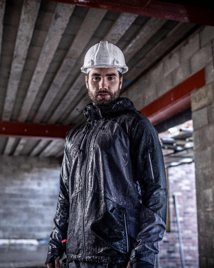 Slate Grey Black coloured Regatta Mens 4Tex Stretch Waterproof Shell Jacket on blurry background #colour_slate-grey-black