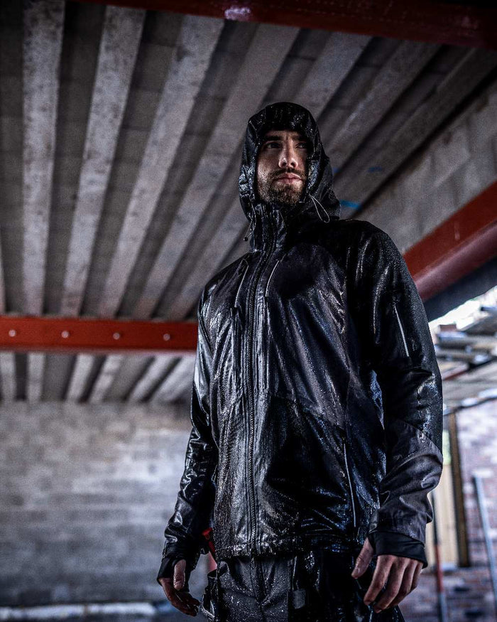 Slate Grey Black coloured Regatta Mens 4Tex Stretch Waterproof Shell Jacket on blurry background #colour_slate-grey-black
