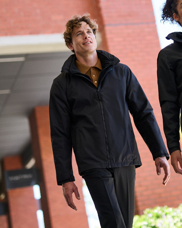 Black coloured Regatta Mens Classic Waterproof 3 in 1 Jacket on wall background #colour_black