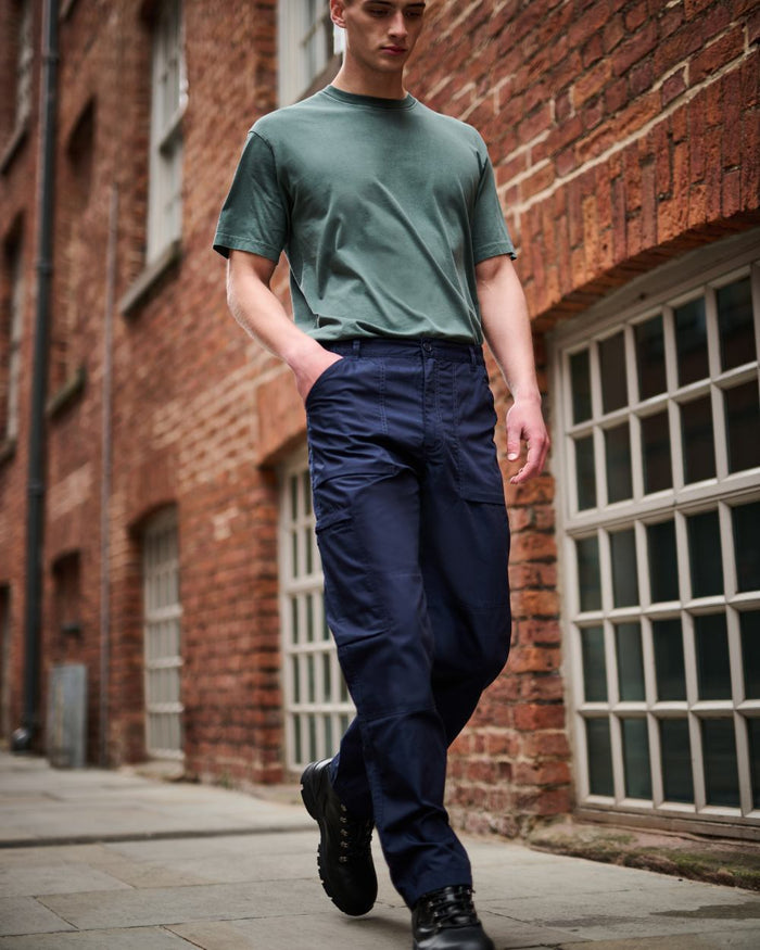 Navy coloured Regatta Mens Multi Pocket Action Trousers Short Leg on street background #colour_navy