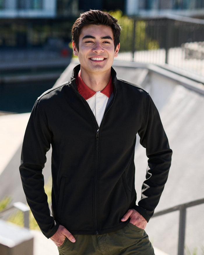 Black coloured Regatta Mens Reid Softshell Jacket on blurry background #colour_black