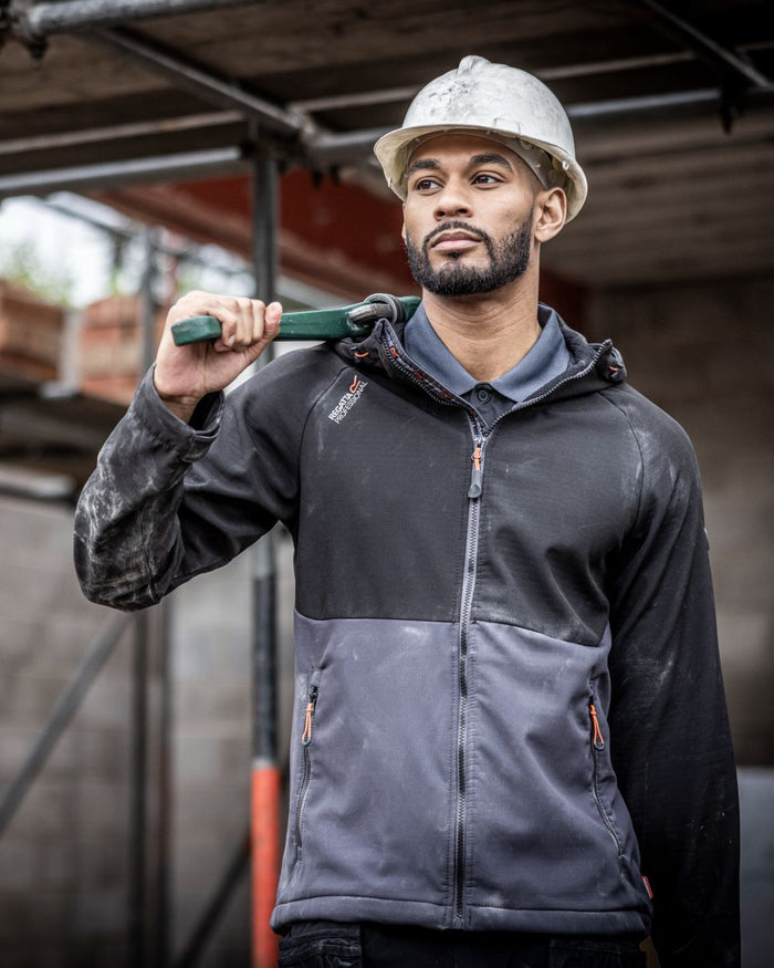 Iron Black coloured Regatta Mens Surrender Softshell Jacket on blurry background #colour_iron-black