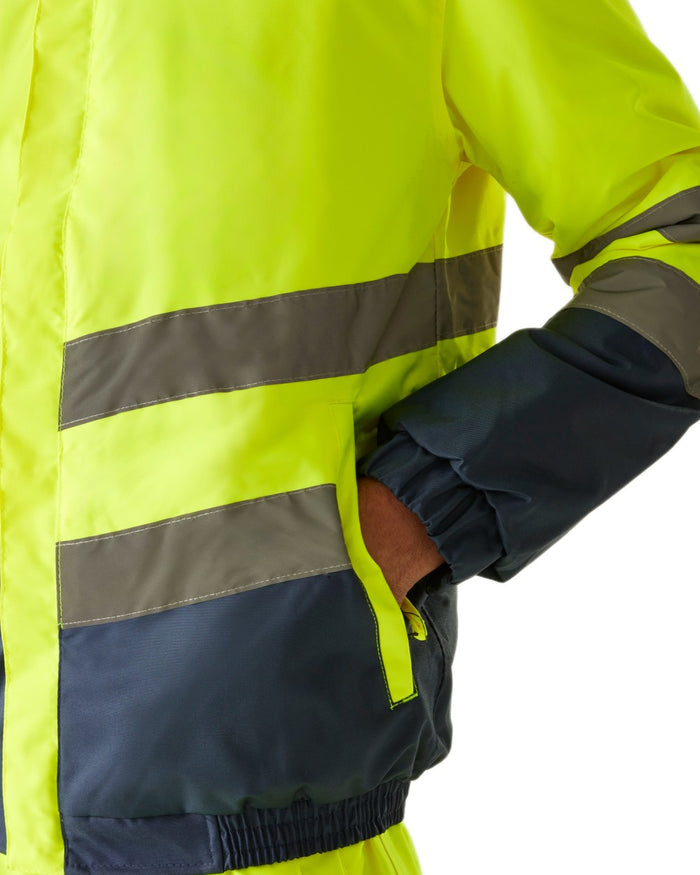 Yellow Navy coloured Regatta Professional Mens Waterproof Hi-Vis Bomber Jacket on white background #colour_yellow-navy