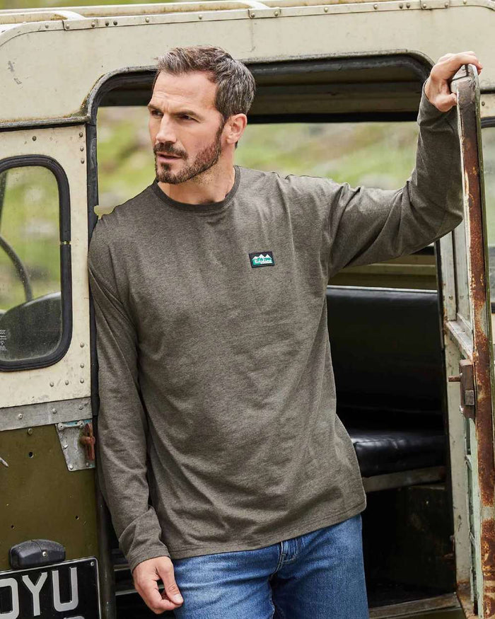 Smokey Olive Marl Coloured Ridgeline Baseline Top on outdoor background #colour_smokey-olive-marl