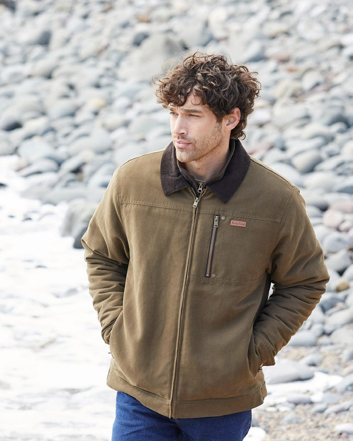 Moody Teak coloured Ridgeline Mens Montana Work Coat on shore background #colour_moody-teak