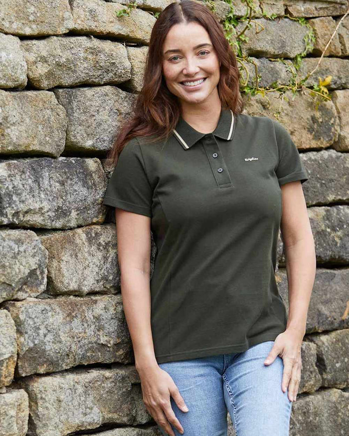 Deep Forest coloured Ridgeline Womens Kilworth Polo Shirt on outdoor background #colour_deep-forest