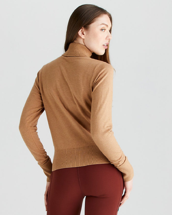 Sienna coloured Ridgeline Womens Melford Knit Roll Neck Jumper on grey background #colour_sienna