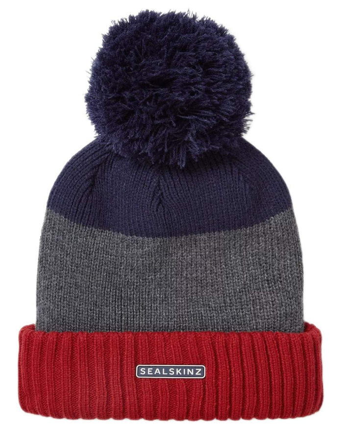 Orange Navy coloured Sealskinz Flitcham Waterproof Cold Weather Bobble Hat on white background #colour_orange-navy