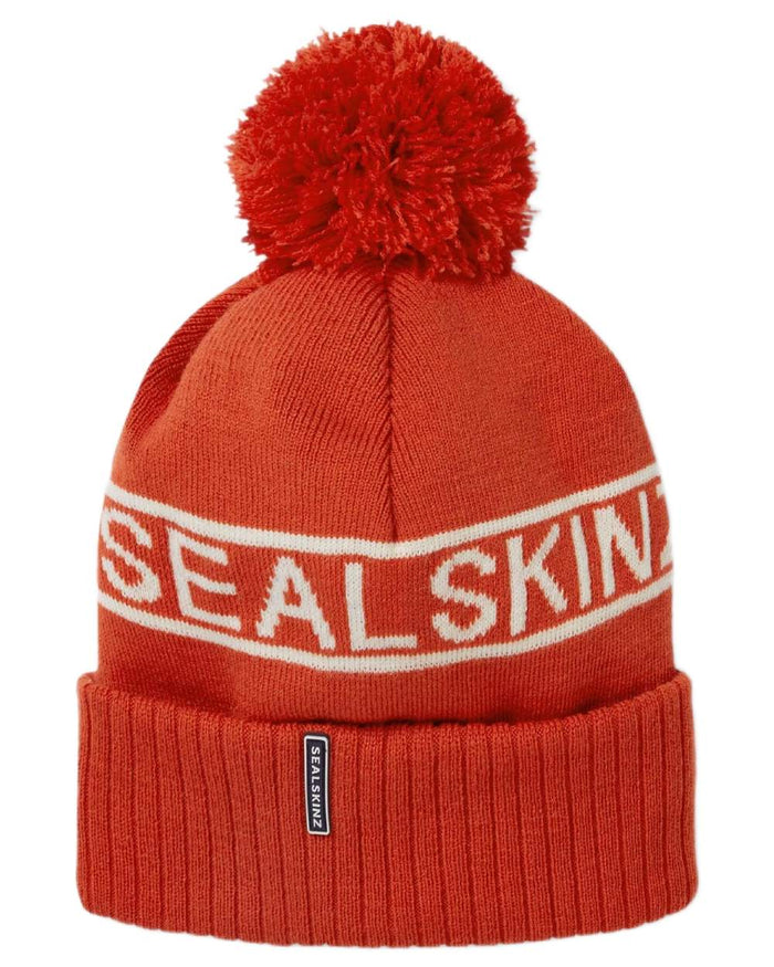 Orange coloured Sealskinz Heacham Waterproof Icon Bobble Hat on white background #colour_orange