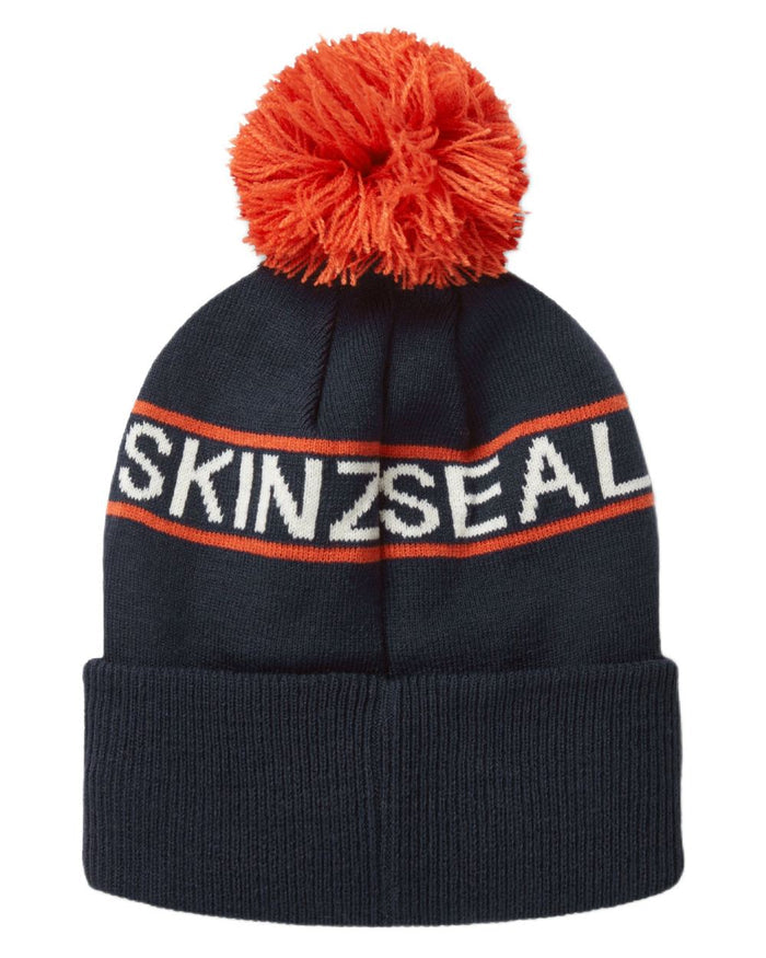 Navy coloured Sealskinz Heacham Waterproof Icon Bobble Hat on white background #colour_navy