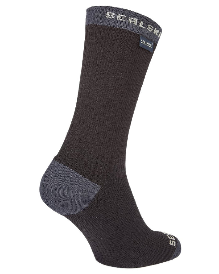 Black coloured Sealskinz Wiveton Waterproof Mid Length Socks on white background #colour_black