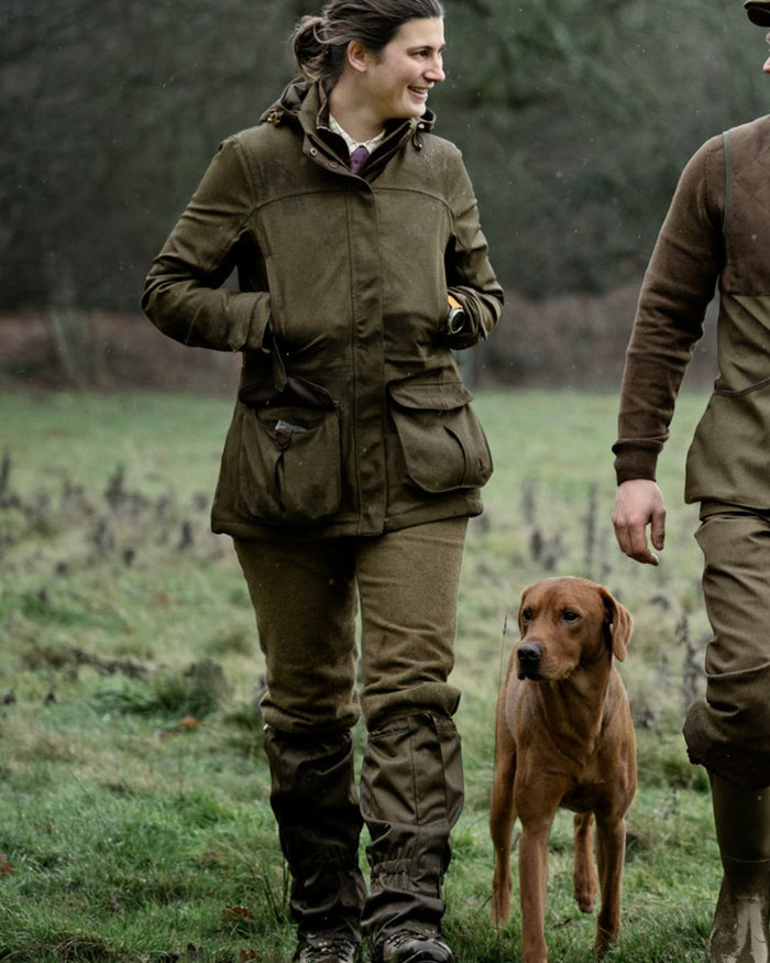 Shaded Olive coloured Seeland Buckthorn Duro Gaiters on forest background #colour_shaded-olive
