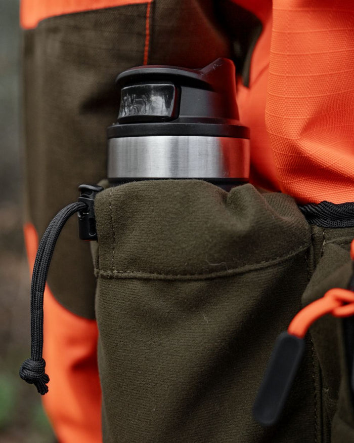 Pine Green coloured Seeland Enduro Utility Waist Pack on forest background #colour_pine-green
