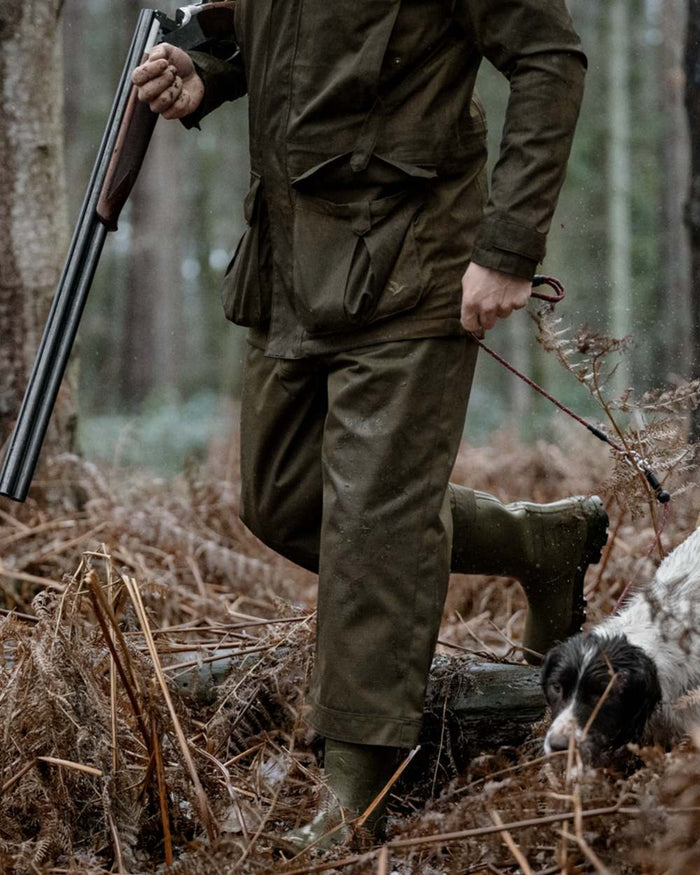 Shaded Olive coloured Seeland Mens Buckthorn Duro Treggings on forest background #colour_shaded-olive