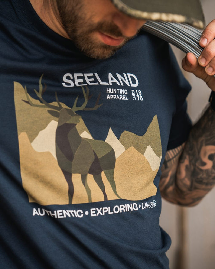 Dark Blue Coloured Seeland Mens Fragment T-Shirt on workshop background #colour_dark-blue