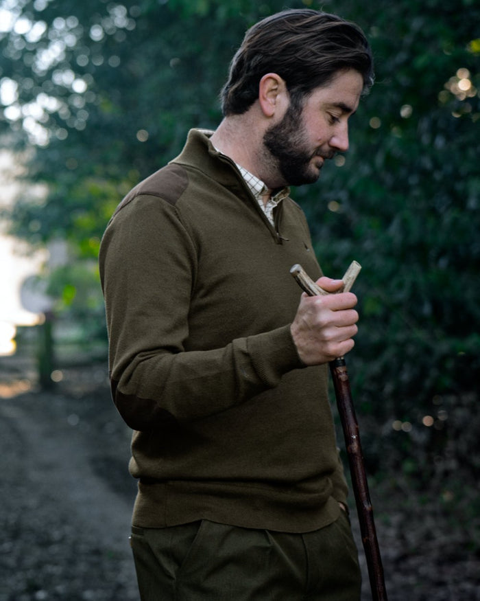 Light Pine coloured Seeland Mens Pine Half Zip Sweater on forest background #colour_light-pine