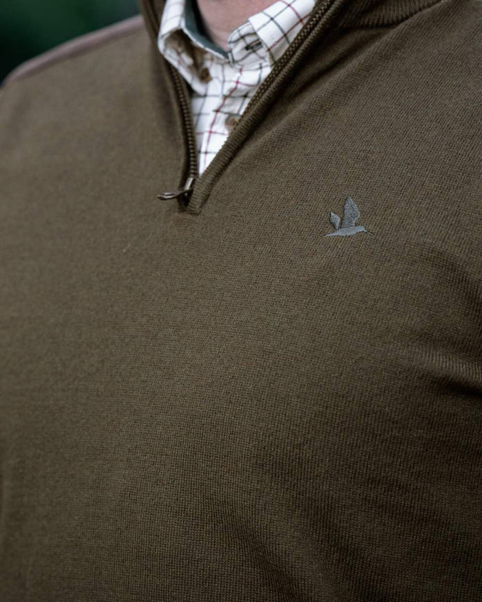 Light Pine coloured Seeland Mens Pine Half Zip Sweater on forest background #colour_light-pine