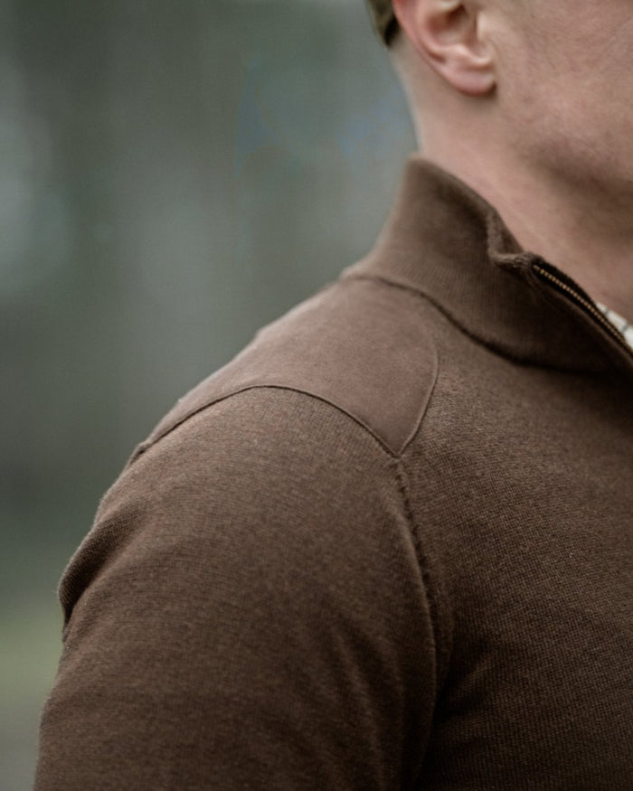 Dark Brown coloured Seeland Mens Pine Half Zip Sweater on forest background #colour_dark-brown