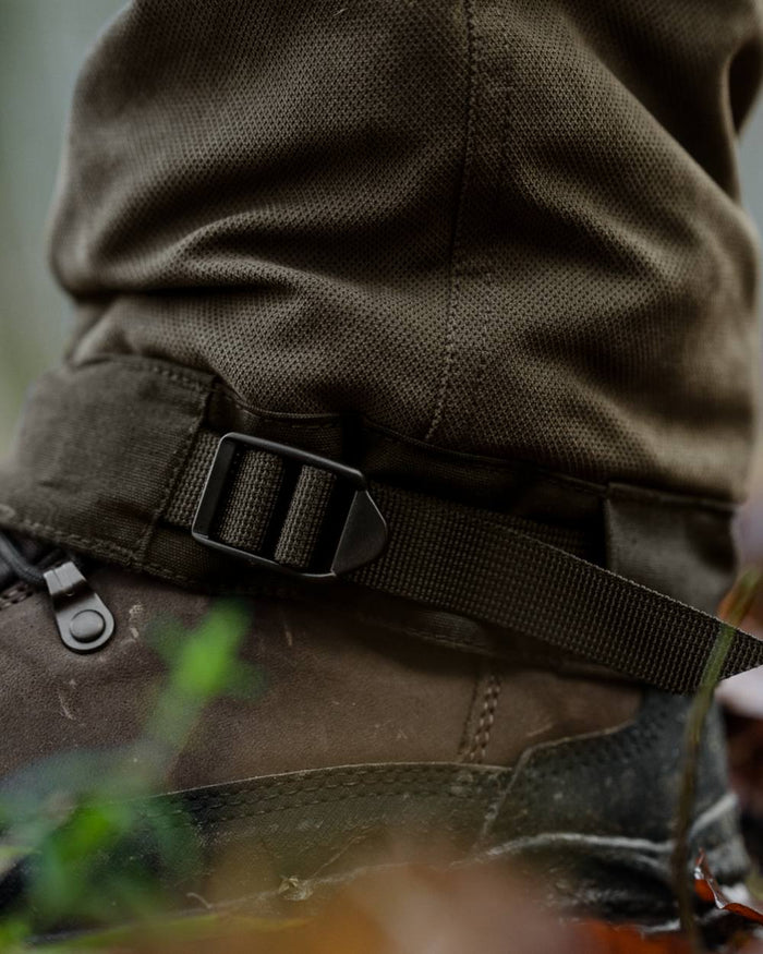 Grizzly Brown coloured Seeland Mens Ultimo Trousers on forest background #colour_grizzly-brown