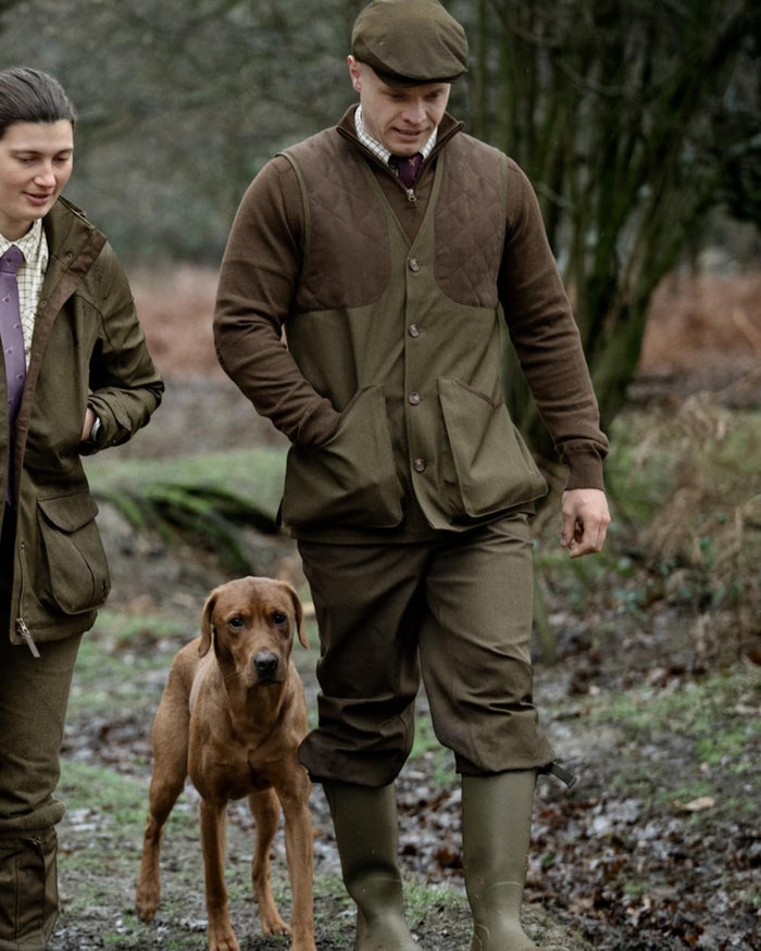 Shaded Olive coloured Seeland Mens Woodcock Royale Breeks on forest background #colour_shaded-olive