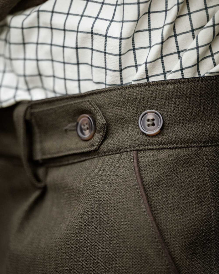 Shaded Olive coloured Seeland Mens Woodcock Royale Breeks on forest background #colour_shaded-olive