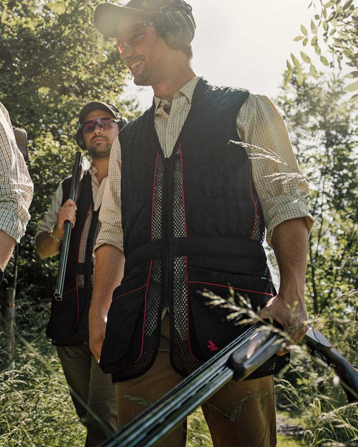 Black coloured Seeland Skeet II Waistcoat on outdoor background #colour_black