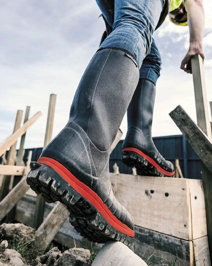 Black Red coloured Skellerup Quatro Super Safety S5 Insulated Black Boot on construction site background #colour_black-red