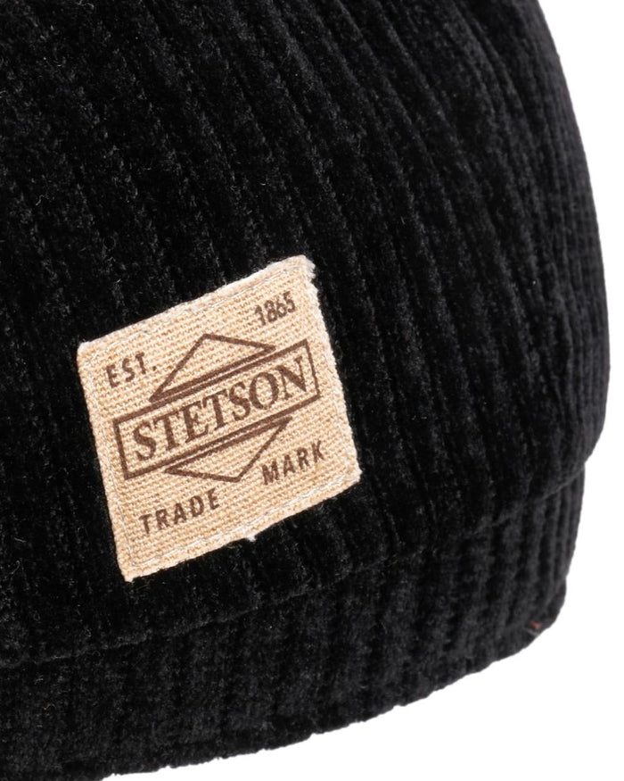 Black coloured Stetson Hatteras Corduroy Jersey Flat Cap on white background #colour_black