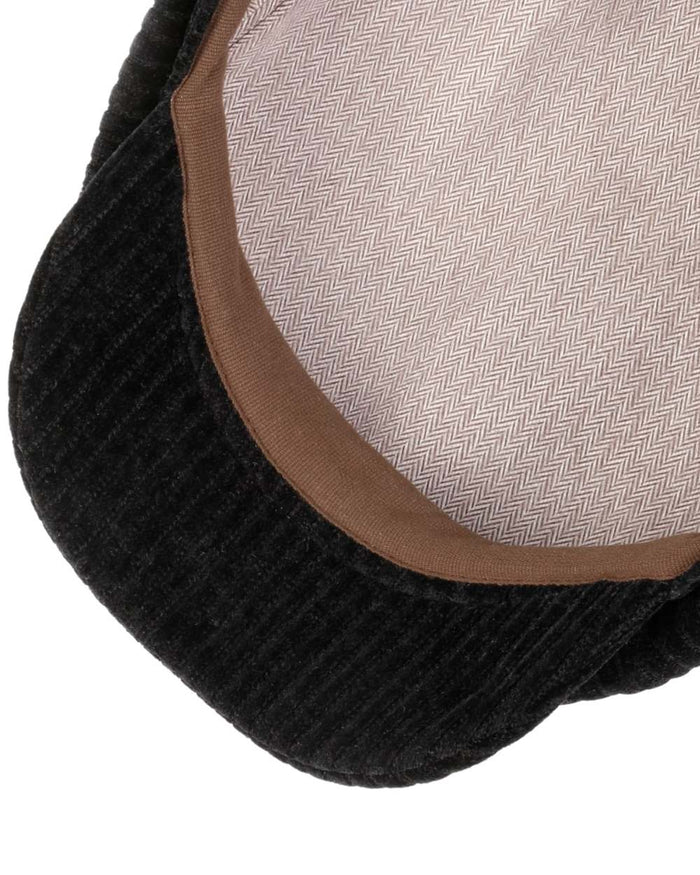 Black coloured Stetson Hatteras Corduroy Jersey Flat Cap on white background #colour_black