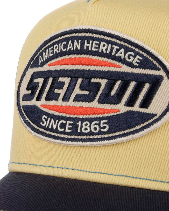 Midnight Blue Light Yellow coloured Stetson High Speed Trucker Cap on white background #colour_midnight-blue-light-yellow