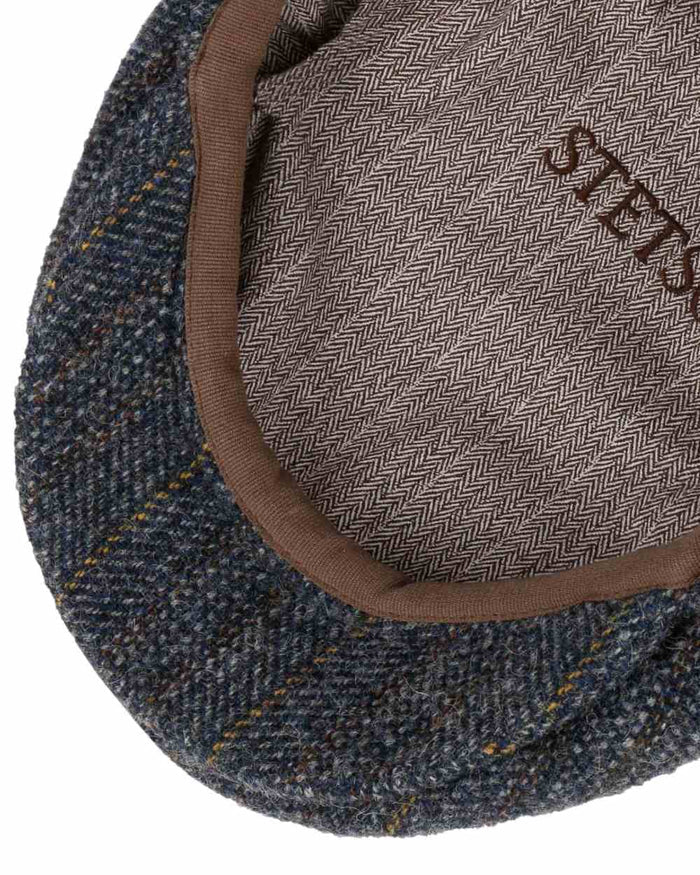 Navy Coloured Stetson Kent Herringbone Stripe Flat Cap On A White Background #colour_navy