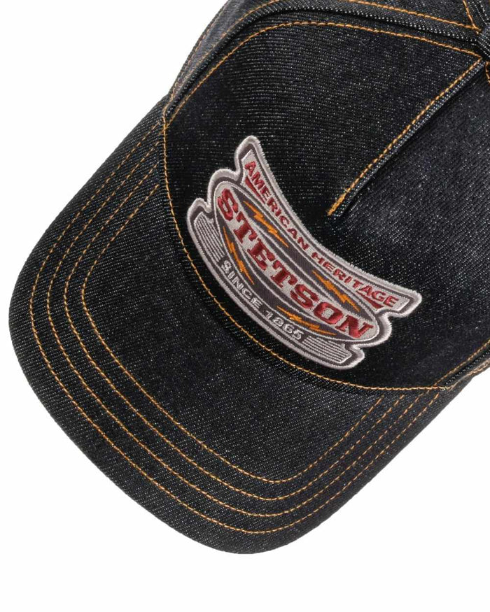 Blue Denim coloured Stetson Lightning Trucker Cap on white background #colour_blue-denim