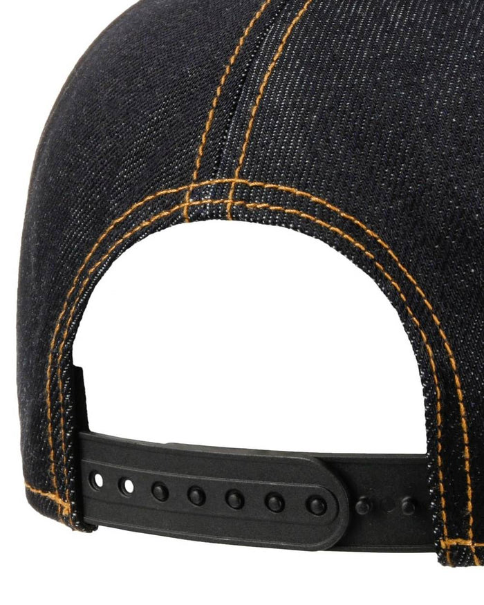 Blue Denim coloured Stetson Lightning Trucker Cap on white background #colour_blue-denim