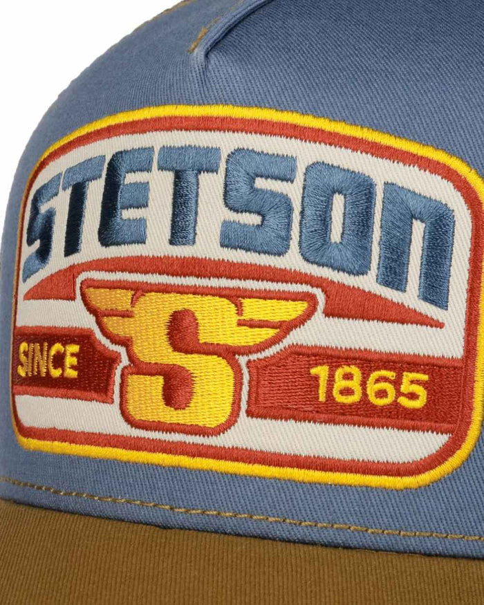 Brown Blue coloured Stetson S Wing Trucker Cap on white background #colour_brown-blue