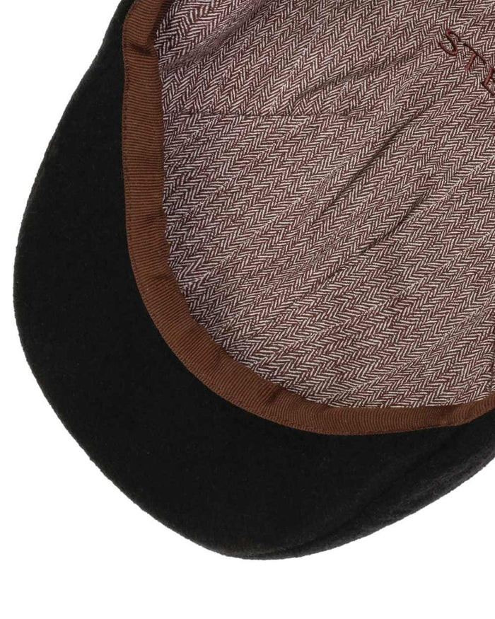 Black coloured Stetson Texas Wool Gatsby Cap on white background #colour_black