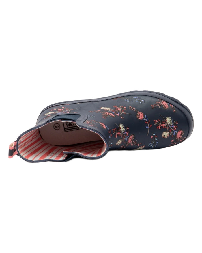 Navy Floral Print coloured Stormwells Womens Floral Printed Wellington Boots on white background #colour_navy-floral-print
