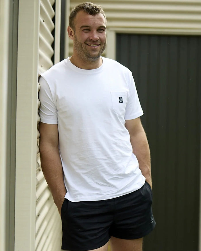 Crisp White coloured Swanndri Mens Duval V3 T-Shirt on outdoor background #colour_crisp-white