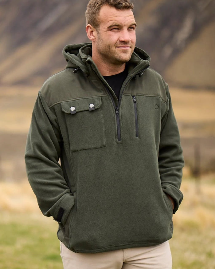 Olive Coloured Swanndri Mens High Rock Technical Fleece Hoodie on mountain background #colour_olive