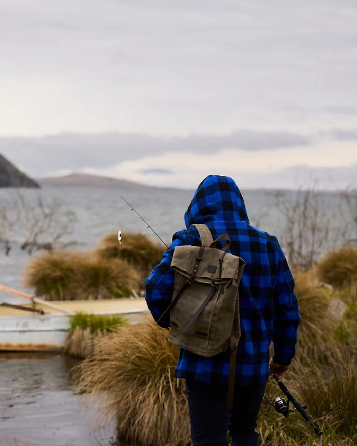 Blue Black Check Coloured Swanndri Mens Hudson Wool Hoodie on sea background #colour_blue-black-check