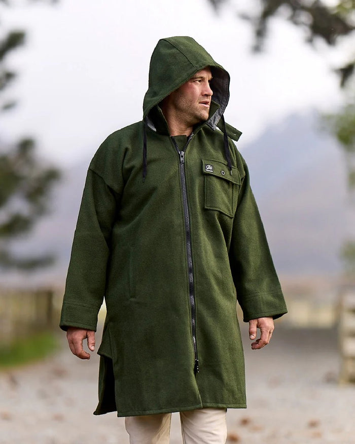 Olive Coloured Swanndri Mens Mosgiel Wool Bushshirt with Zip-up Front on blurry background #colour_olive
