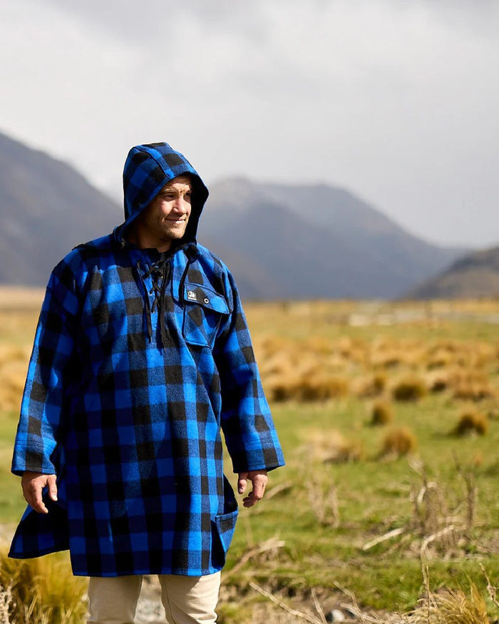 Blue Black Check Coloured Swanndri Mens Original Wool Bushshirt With Lace-Up Front on mountain background #colour_blue-black-check