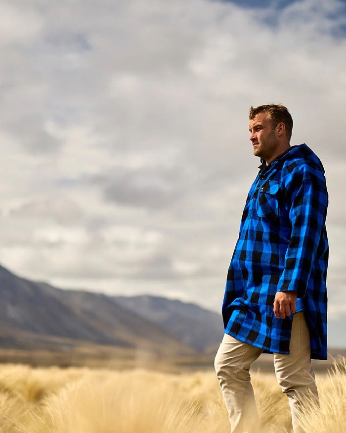 Blue Black Check Coloured Swanndri Mens Original Wool Bushshirt With Lace-Up Front on mountain background #colour_blue-black-check