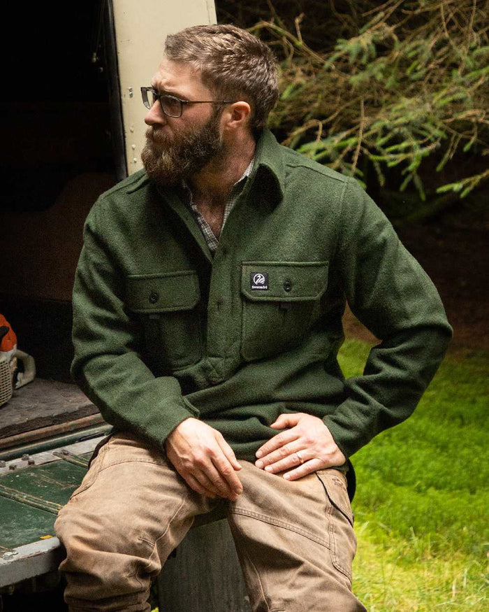 Olive Coloured Swanndri Mens Ranger Extreme V2 on outdoor background #colour_olive