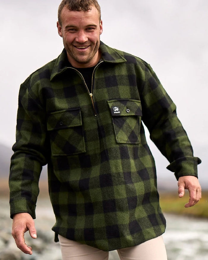 Olive Black Check Coloured Swanndri Mens Ranger Wool Zip Front Bushshirt on blurry background #colour_olive-black-check