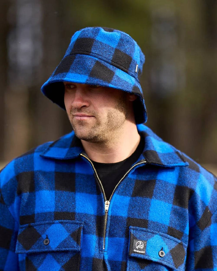 Blue Black Check Coloured Swanndri Mens Ranger Wool Zip Front Bushshirt on blurry background #colour_blue-black-check
