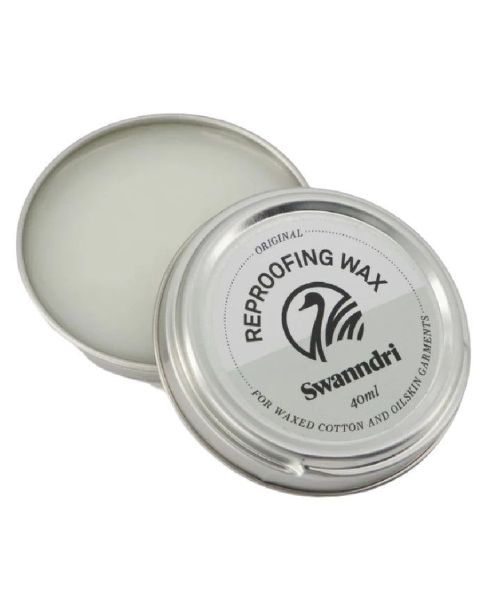 Neutral Coloured Swanndri Wax Tin for Re-proofing Oilskin Vests and Jackets on white background #colour_neutral