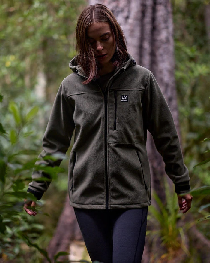 Forest Coloured Swanndri Womens High Rock Stormshield Jacket on outdoor background #colour_forest