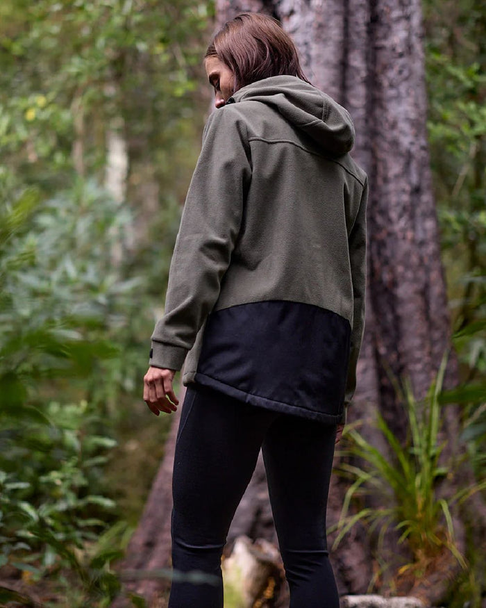 Forest Coloured Swanndri Womens High Rock Stormshield Jacket on outdoor background #colour_forest