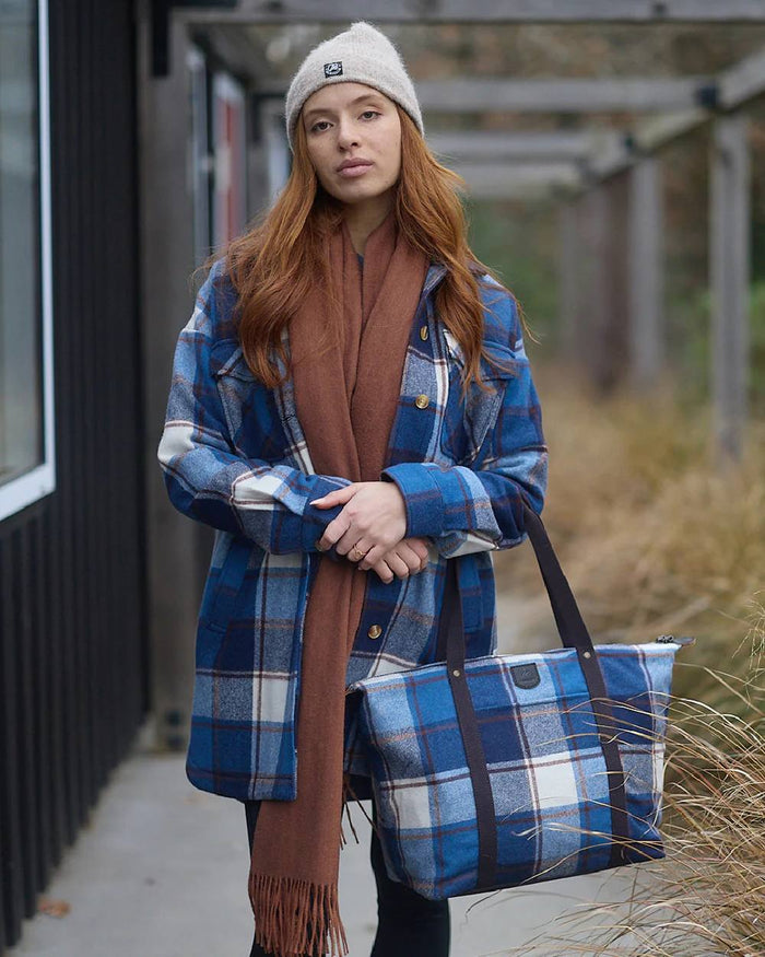Rusty Coloured Swanndri Womens Wide Scarf on outdoor background #colour_rusty