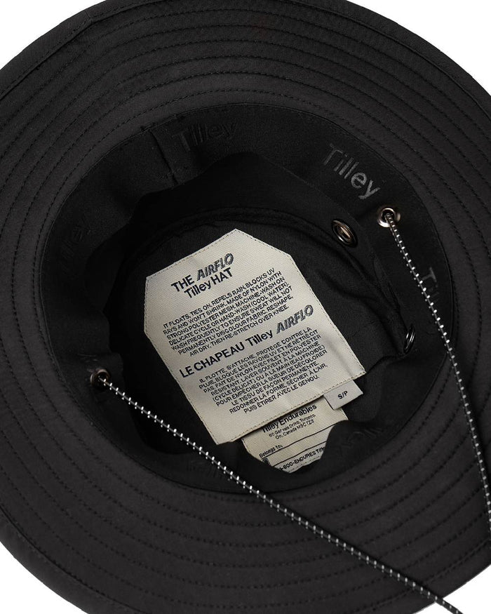 Black Coloured Tilley Rain Hat On A White Background #colour_black